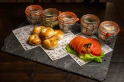 5 mini bagels, tuna salad, smoked whitefish salad, egg salad, chicken truffle salad, lox, cream cheese, lettuce, tomatoes and onions
