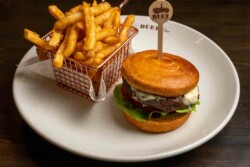 Caramelized onions, blue cheese, lettuce, tomatoes, pickles, onions. Served with French fries or Sweet potato fries